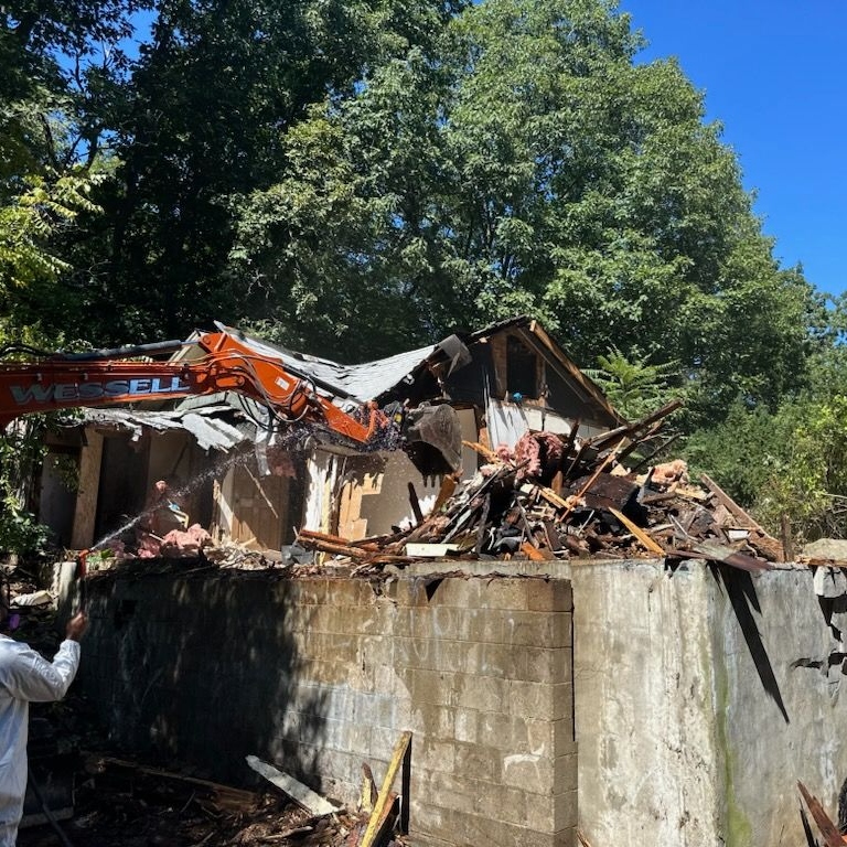 Comprehensive Demolition and Asbestos Abatement of a Structurally Unsound Residential Property in Lynnfield, MA