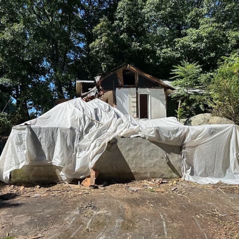 Comprehensive Demolition and Asbestos Abatement of a Structurally Unsound Residential Property in Lynnfield, MA